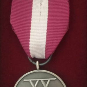 Srebrny medal za długoletnią służbe.