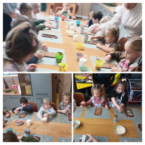 Dzieci siedzą przy stole i wykonują czekoladę